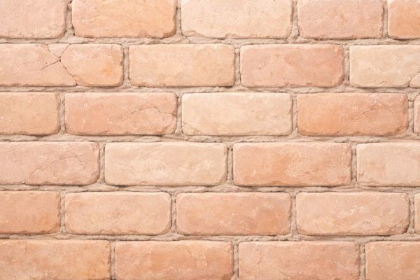 Ziegelsteinmauer als Symbol für die Hautbarriere der Haut